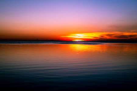 A spectacular sunset on Tampa Bay near St. Petersburg Florida.の写真素材