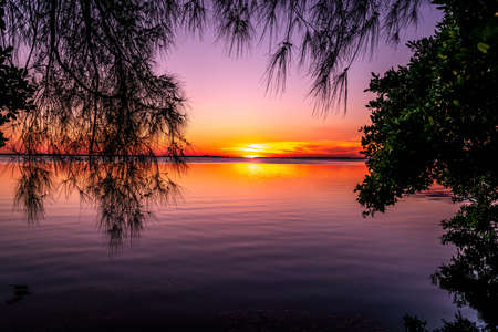 A spectacular sunset on Tampa Bay near St. Petersburg Florida.の写真素材