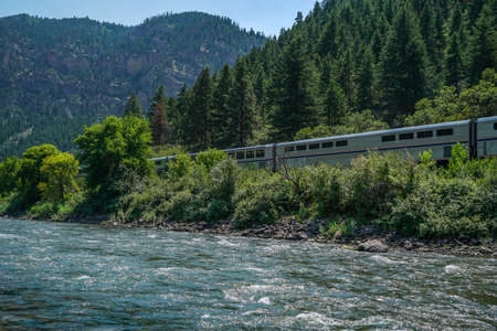 The train passengers have a truly spectacular view of the river valley.の写真素材