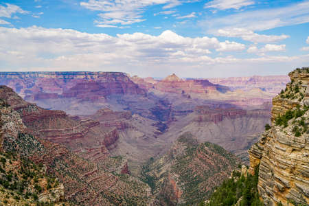 Some different views of the south rim of the Grand Canyon in Arizona. Wildfires in the area caused the haze in the air.の写真素材