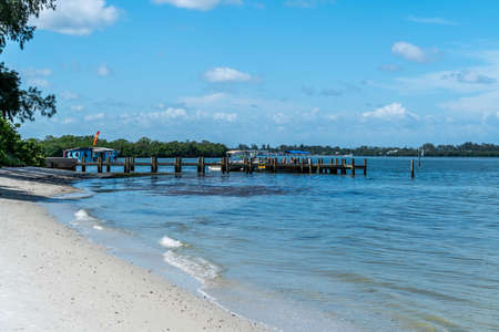 A warm and breezy day at the beach on Anna Maria Island in Southwest Florida.のeditorial素材