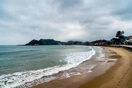 The city of Ribadesella Spain is a very beautiful seaside town that is also popular with the surfers.の写真素材