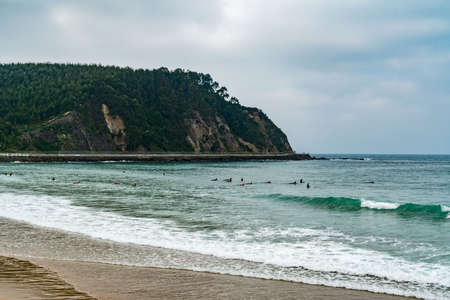 The city of Ribadesella Spain is a very beautiful seaside town that is also popular with the surfers.の写真素材