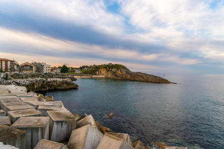 The break wall as you enter the harbor in Llanes Spain.