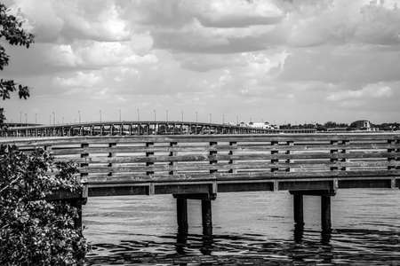The fishing piers on Charlotte Harbor in southwest Florida in black and white.の写真素材