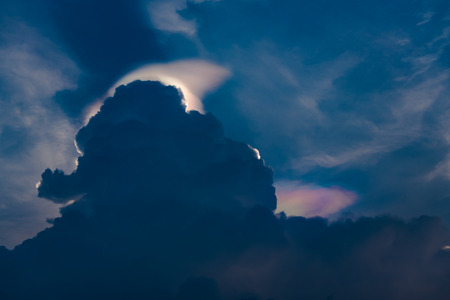 Stratocumulus irisation clouds in sunset time on Bangkok, Thailand.