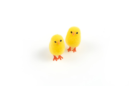 Easter, small chick and colored eggs