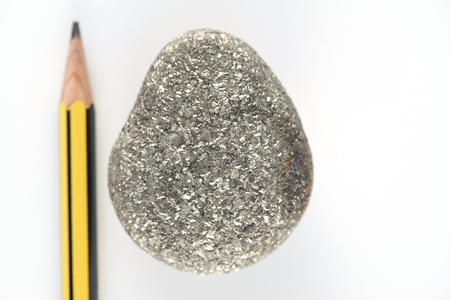 Pyrite stone on white background