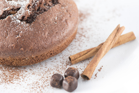 Cocoa Cake with cinnamon and chocolatesの写真素材
