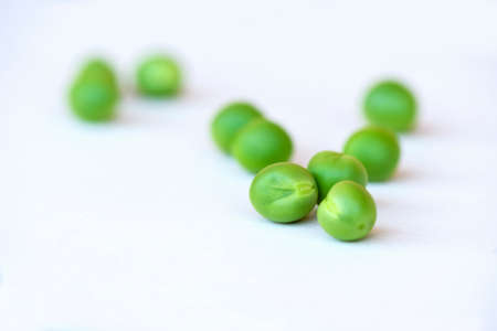 Green Peas fresh vegetable isolated on white backgroundの写真素材
