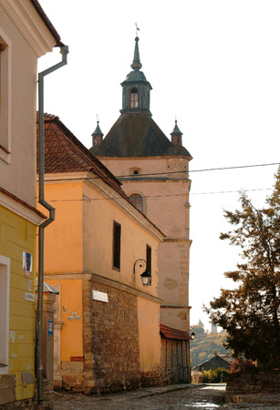 Armenian church bell tower in Kamenets-Podilsky, Ukraine. Autumn view.の写真素材