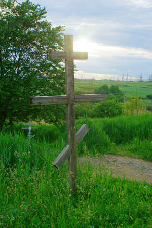 Wooden Orthodox cross shot at sunset.の写真素材