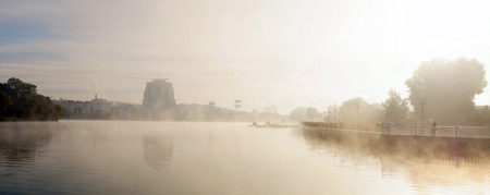 Autumn fogy waterfront of city Khmelnitsky, Ukraine.の写真素材