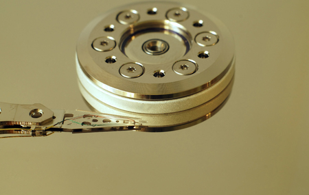 Hard disk drive without cover. Inside hard disk. Data storage technology. Backup your information. Big data.の写真素材