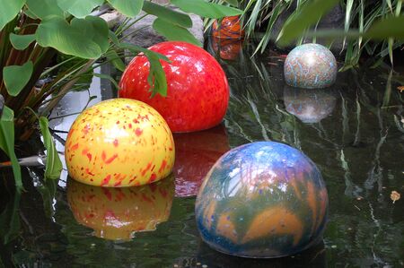 spheres in a poolの写真素材