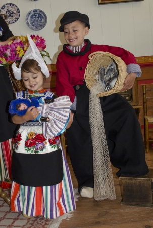 Kid in traditional dutch clothesの写真素材