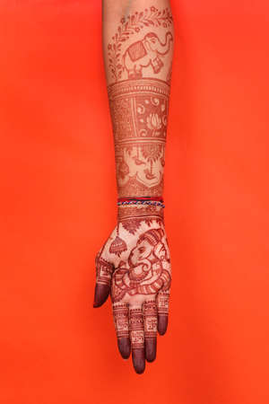 Ledy Feet and Hands in Heena for wedding in white background and isolated hand and feet | hand design | feet design | beautiful design | nice designの写真素材