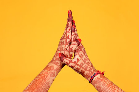 Ledy Feet and Hands in Heena for wedding in white background and isolated hand and feet | hand design | feet design | beautiful design | nice designの写真素材