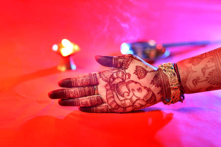 Ledy Feet and Hands in Heena for wedding in white background and isolated hand and feet | hand design | feet design | beautiful design | nice designの写真素材