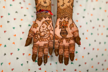 Ledy Feet and Hands in Heena for wedding in white background and isolated hand and feet | hand design | feet design | beautiful design | nice designの写真素材