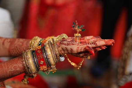 indian wedding fill story with bridal and groom start to end with fashion  tasty food, jewellery  decoration  saptapadi samayu javtal ganesh Puja beautiful background all wedding rituals sindurの写真素材