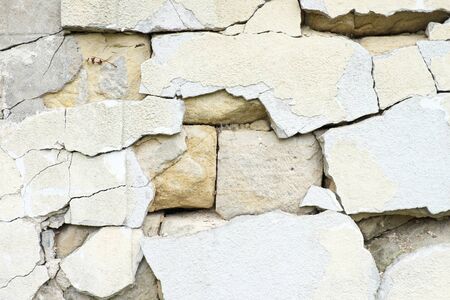 Poor wall. Grunge Mosaic Stone Wall. Nice natural background.の写真素材