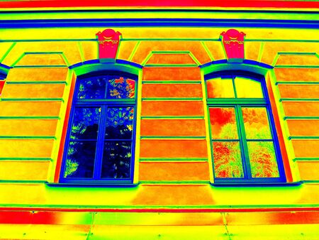 Thermography scan. Traditional construction of bricks house with old style windows. Thermal waste map. Just effect.の写真素材