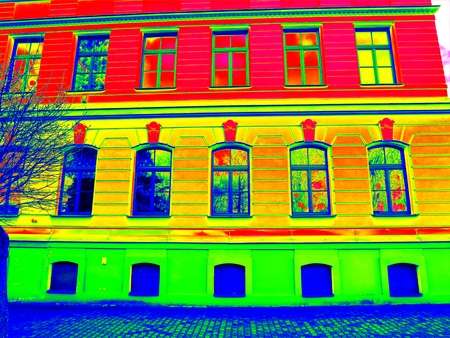 Thermography scan. Traditional construction of bricks house with old style windows. Thermal waste map. Just effect.の写真素材