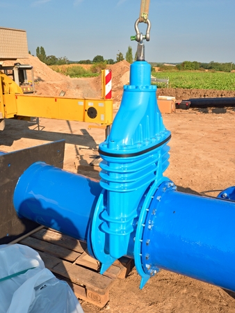 500mm big new drink water Gate valve joint with screws and nuts to pipe fitting. Piping repair, unit...