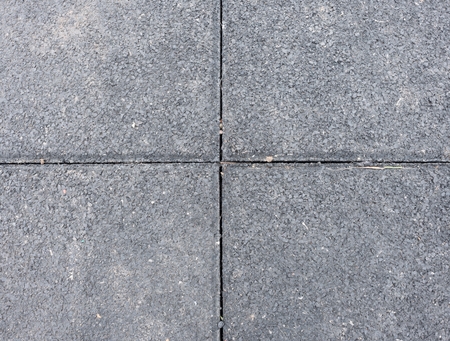 Flexible tile for playground. Tiles made from a mixture of rubber crumb and a flexible core. Flexible floor for outdoor exerciseの写真素材