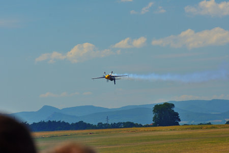 Memorial Airshow, 24th of June 2017, Roudnice, Czech Republic. The aerobatic team flying in Extra 330, especial  aerobatic planeのeditorial素材