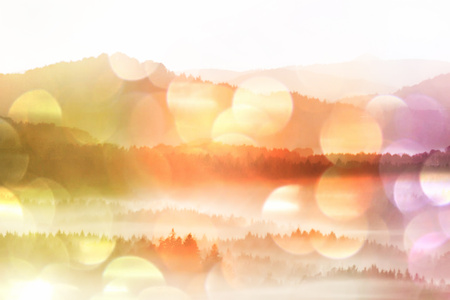 Film grain effect. Amazing  daybreak in Saxony Switzerland park. Sandstone peaks increased from foggy backgroundの写真素材