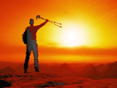 Low poly design. Looking to horizon. Man on a rock  looking to horizon. Orange gradient styleの写真素材