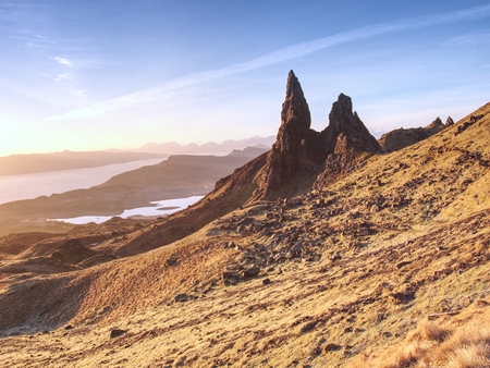 Morning view of Old Man of Storr rocks formation and lake Scotland. The one of the most photographed wonders in the Scotland.の写真素材