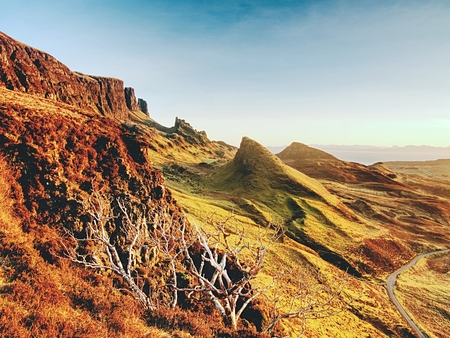 Sunny morning in Quiraing mountains. Hilly landscape of Isle of Skye, Scottish Highlands. Breathtaking viewの写真素材