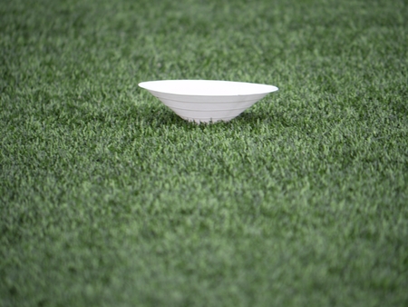 Training mark in soccer playfield. White marks on artificial green turf background. Winter football playground with plastic grass.の写真素材