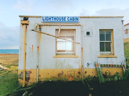 Must see Neist Point lighthouse. Mess inside of abandoned building. Popular travel destination on  Isle of Sky, Scotland.の写真素材