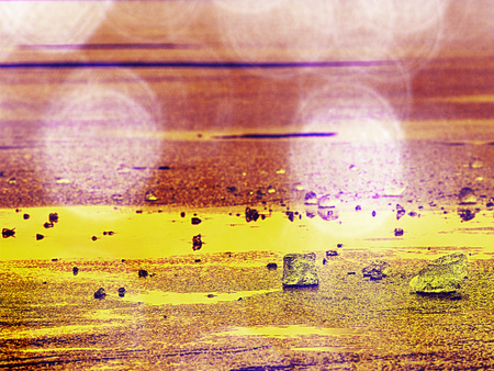 Melting ice tip of the iceberg. The sun shines through ice cracks and create interesting reflections... Hipster filter.の写真素材