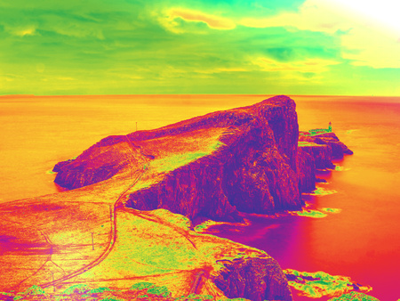 Neist Point Lighthouse. Popular photographers on the Isle of Skye in Scotland. Hipster filter.の写真素材