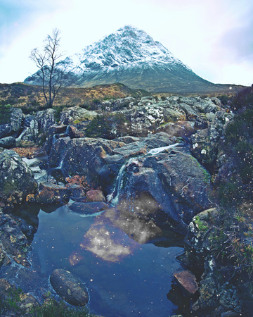 Popular trek. Waterfall between sharp exposed rocks, the Fairy pools on the Isle of Skye, Scotland.   Hipster filter.の写真素材
