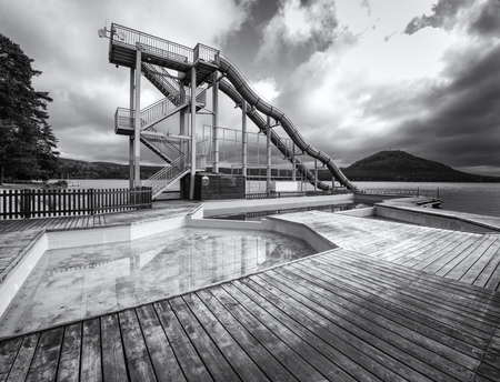 Aquapark at Machovo lake, Czech Republic 24th of Seprtember 2018.  Cold autumn morning with misty...