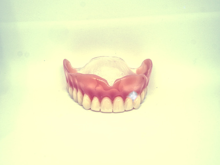 Abstract filter.  Closeup of dental prosthesis. Artificial teeth.