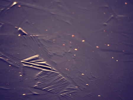 Reflecting ice on the smooth water surface. Unique nature colors.の写真素材