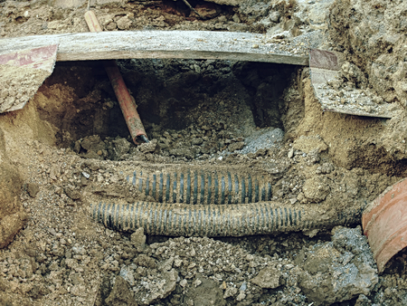Building of lines of metallic and fiber optic cables connection. Excavation of trench by hand or...