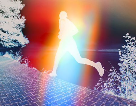 Abstract, over filtered. Man running at the seashore beach, sport lesson. Man silhouette running at...