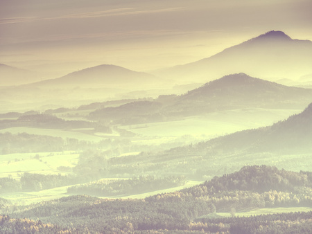 Abstract filter.  View over high sharp peaks from plane beautiful view. Fantastic dreamy sunrise...