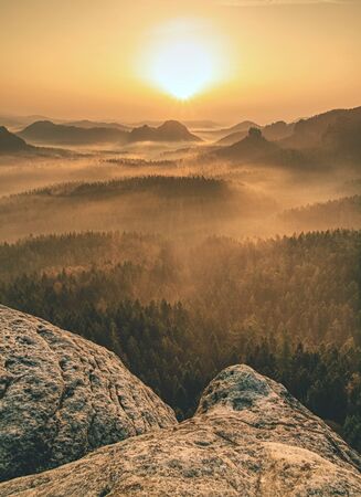 Rocky hills at sunrise. Breathtaking landscape of the morning desert rocksの写真素材