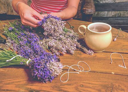 Many Purple levander flower on old wooden table. Beautiful lavender flower from my flower gardenの写真素材