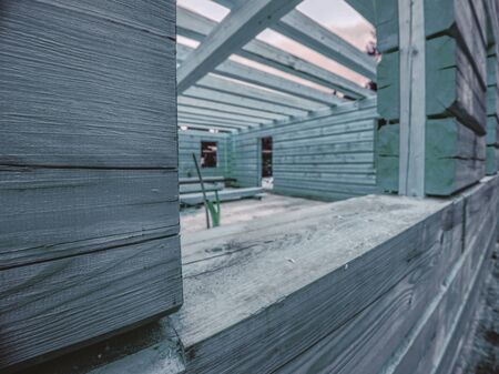 Corner connection of wooden log house. Timber house wall from wood logs.