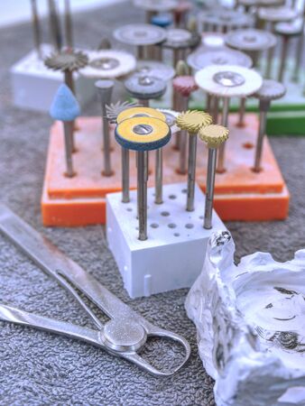 Dental medical tools, dentist equipment. Stomatological drills, milling cutters for  dental burs  on...